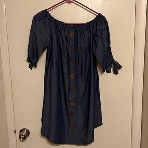 I am selling a dress from rainbow in a blue Jean color, brown buttons. Size S
